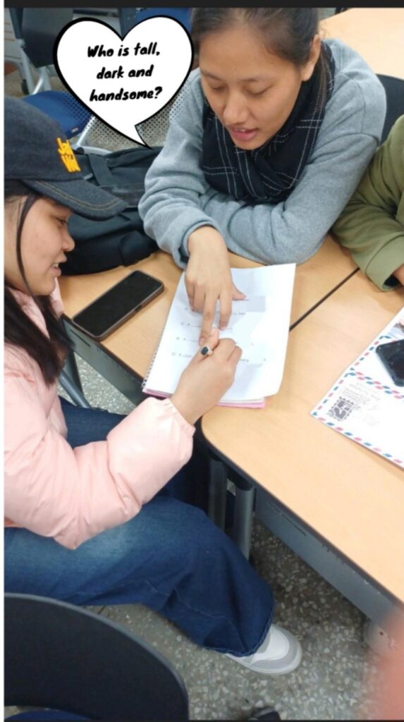 University students in an ESL class practicing adjectives.